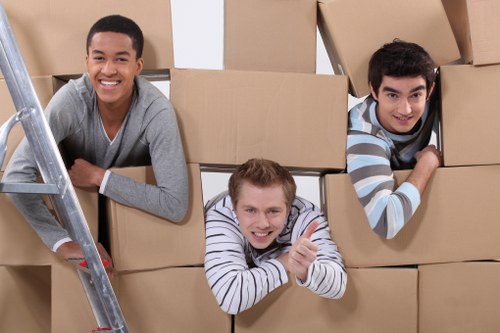 Packed boxes and furniture ready for urgent removals service
