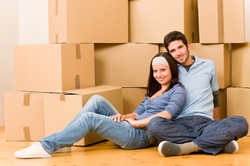 Packed boxes and furniture prepared for transport by removal van