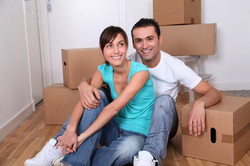 Office furniture and equipment being prepared for a local move