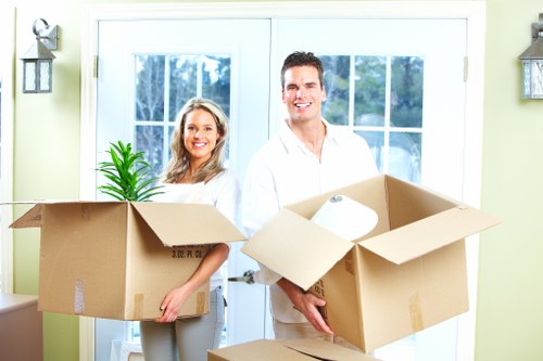 Commercial relocation team packing office equipment and files
